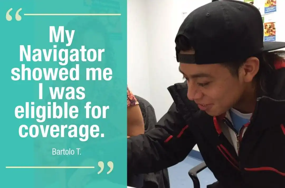 young man reviewing his health insurance options with a health navigator