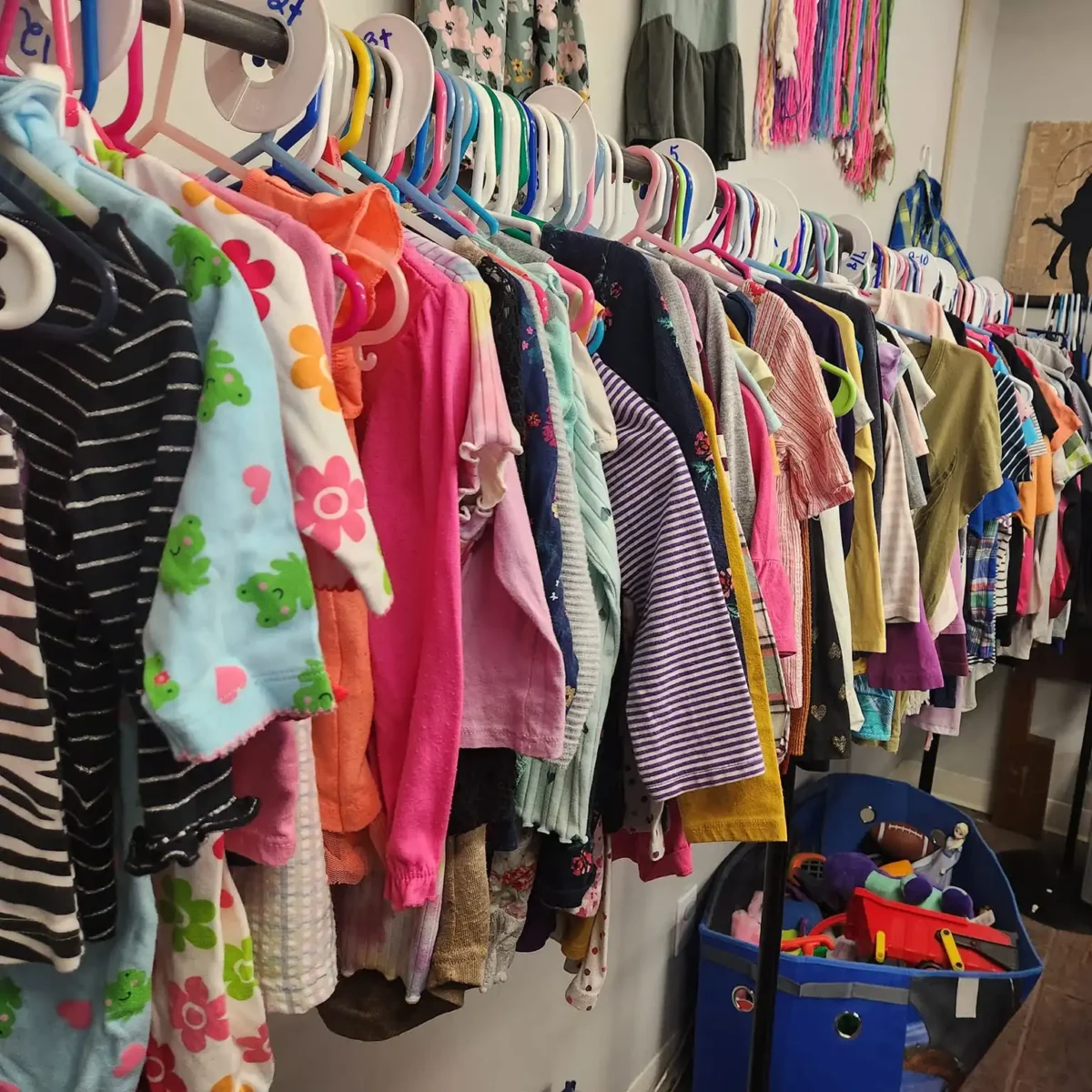 rack of childrens clothes