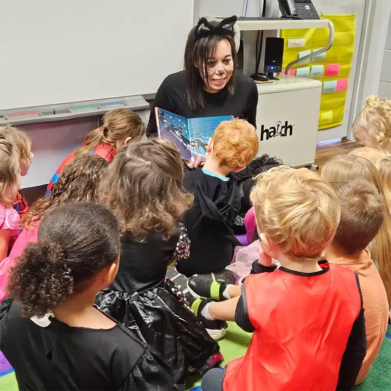 children listening to story at a head start program