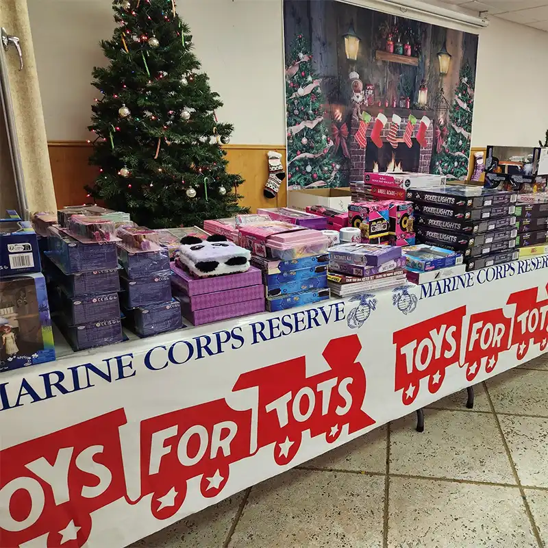 A collection of donated toys for the Toys for Tots drive