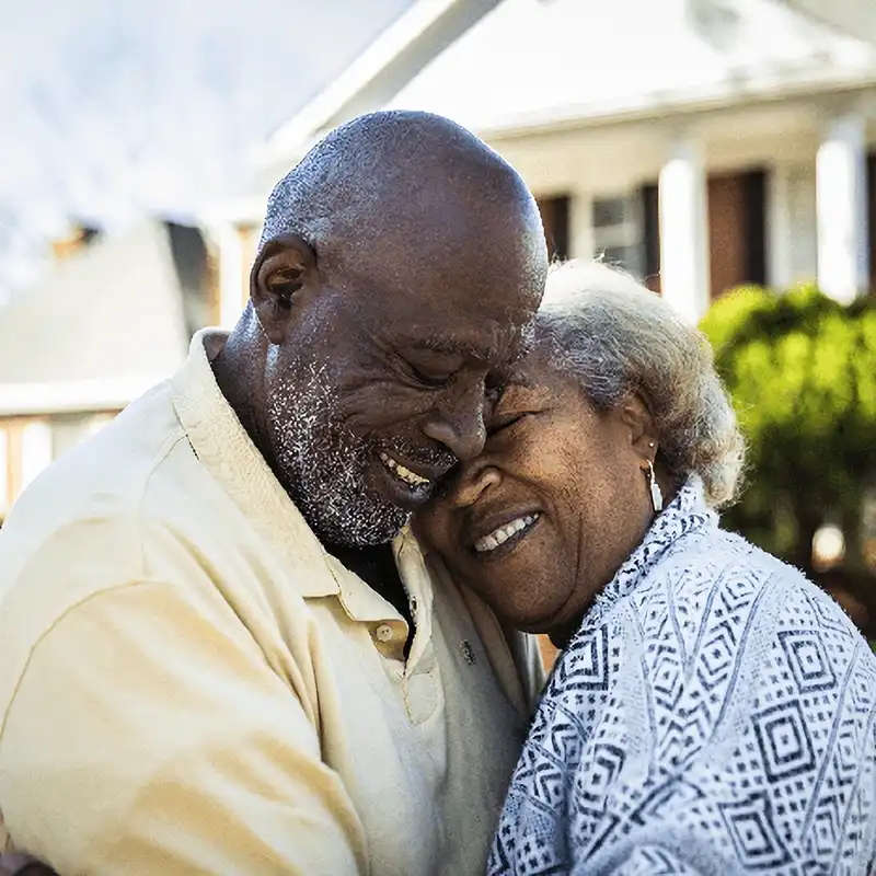 Elderly black couple happy