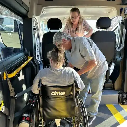 Handicapped rider in a JAMM Transit shuttle